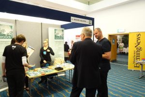 Wirral-Biz-Fair-2016-Woods-Squared-talking-visitor